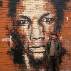 Bristol musician Adrian Thaws - or Tricky... on a wall for UPFEST urban art festival.